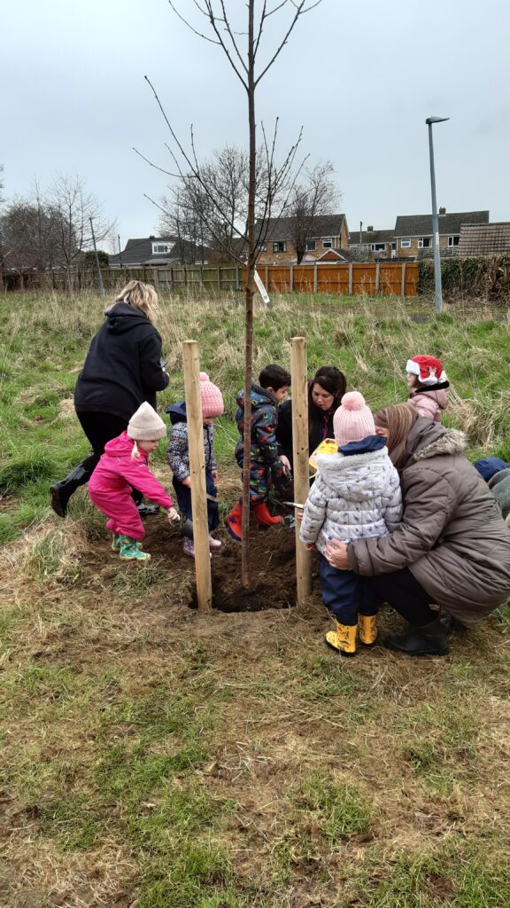 Volunteers and school children planting trees in Scartho