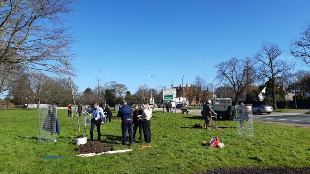 Tree planting by staff and students at Grimsby Institute