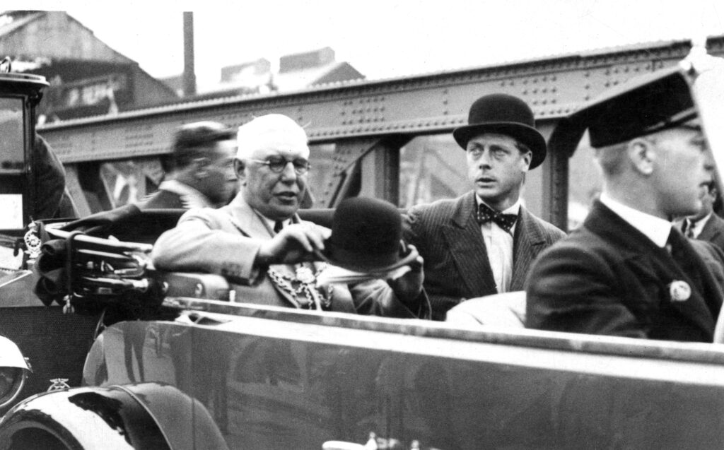 19th July 1928: Prince Edward, Prince of Wales, and the Mayor of Grimsby, Councillor K Osmond in a Daimler Double Six touring car. They are passing over the newly opened Corporation Bridge after its official opening and are on their way to the Town Hall for lunch.