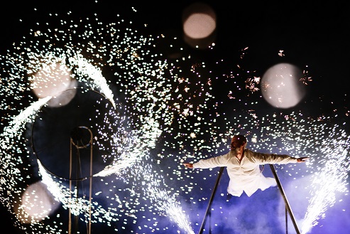 Performers and a light show at The Twilight Hour, by Periplum, at the Festival of the Sky in Cleethorpes.