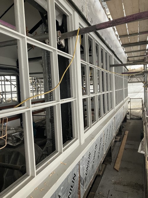 A picture of the control room windows of the bridge