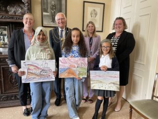 The winning artists pictured with Council representatives.