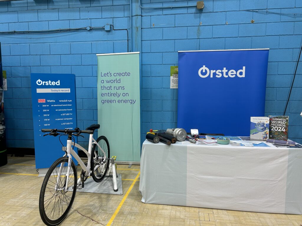Electric bike and stall at a careers fair