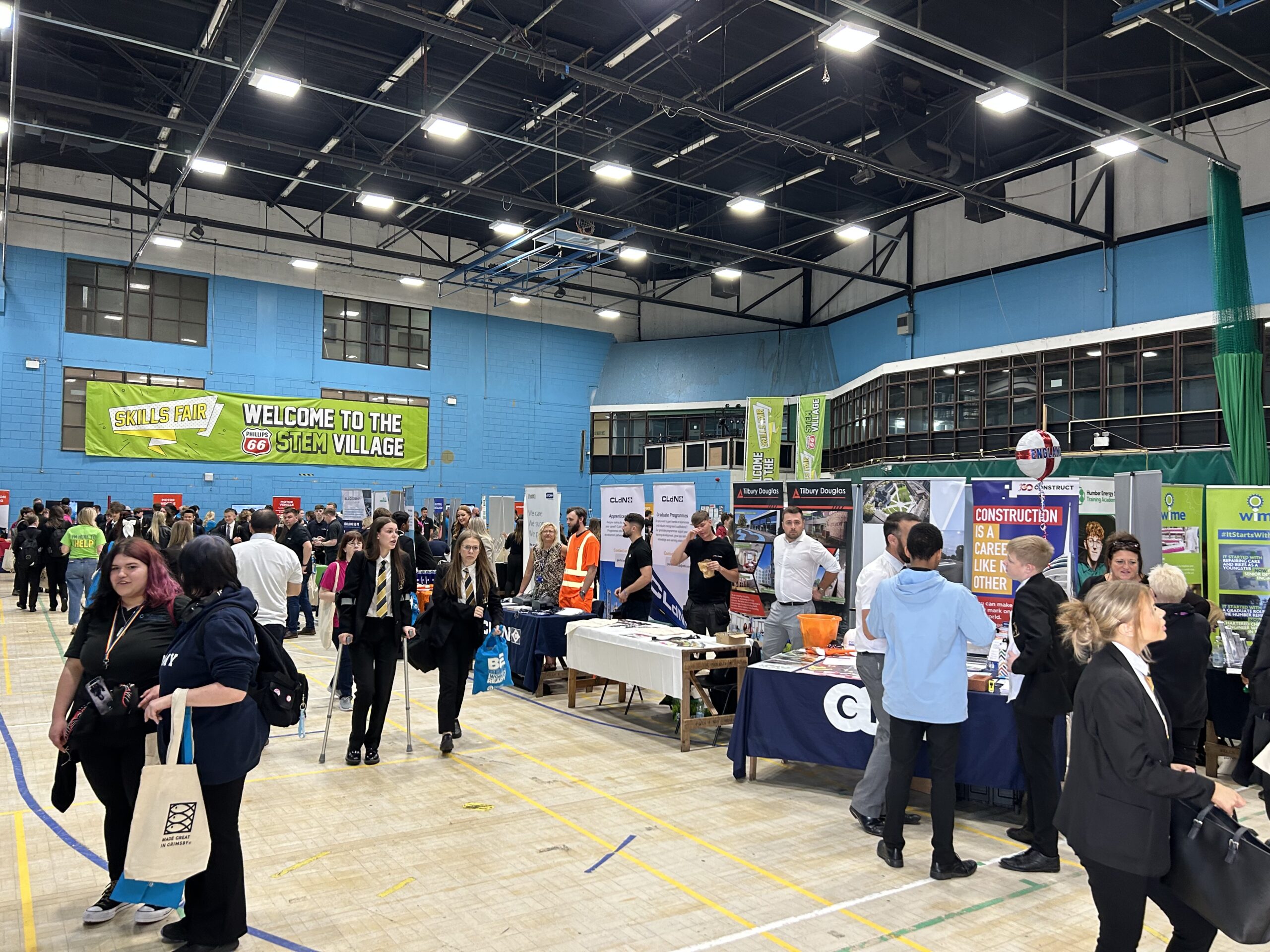 Busy hall filled with students at a careers fair