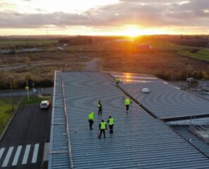 People on the roof with solar panels