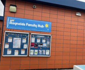 A photo of a Reynolds Family Hub sign