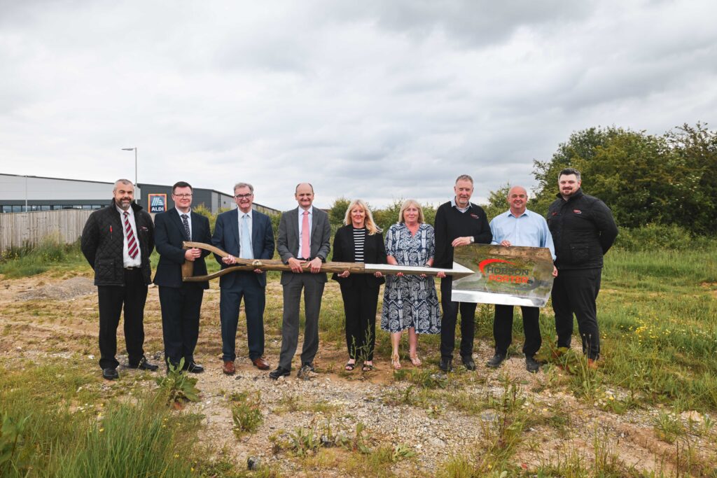 A photo of the contractors with representatives from the council and academy trust.