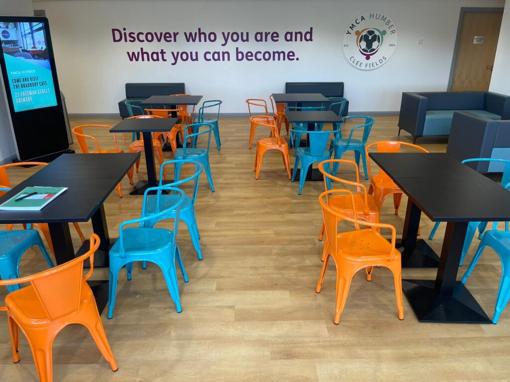 Chairs and tables inside YMCA Humber's facility on Clee Fields