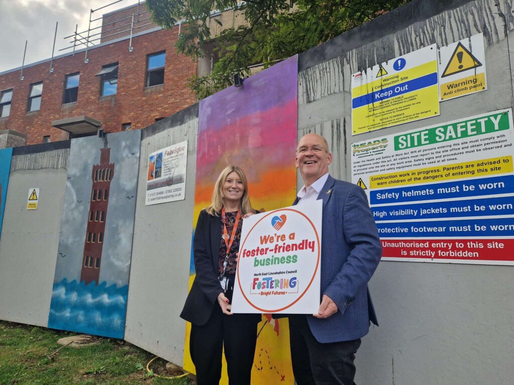 Attached is a photo of the Council's Director of Children's Services, Ann-Marie Matson, with E-Factor Managing Director Mark Webb, pictured in St. James Sq, Grimsby.
