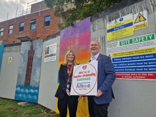 Attached is a photo of the Council's Director of Children's Services, Ann-Marie Matson, with E-Factor Managing Director Mark Webb, pictured in St. James Sq, Grimsby.