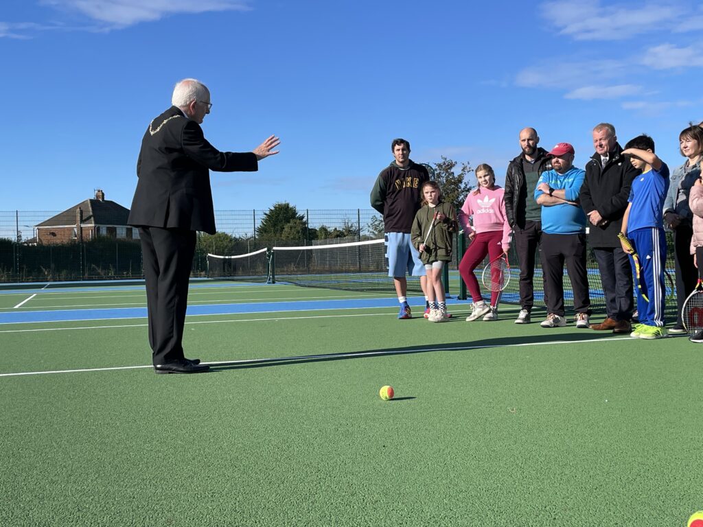 Mayor speaking at the opening of the tennis courts in North East Lincolnshire