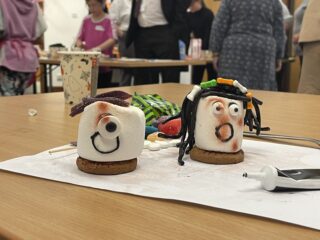 A photo of some marshmallow ghosts.