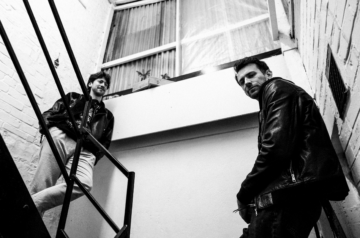 Two men on a staircase