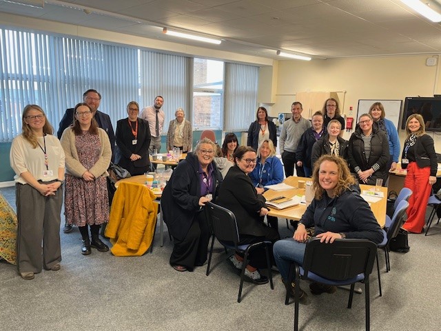 Photo of members of NELC council, partners and parents and Grange Primary School