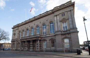A photo of Grimsby Town Hall, against blue skies