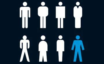 A black and white image showing 8 people, with one shown in blue, depicting the 1-in-8 risk of prostate cancer.