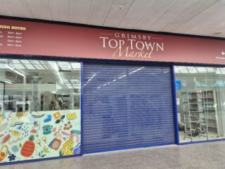 Entrance to Top Town Market ahead of opening