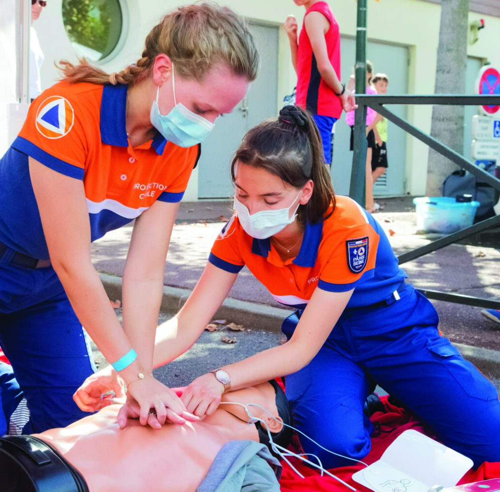 Two women in a first aid course