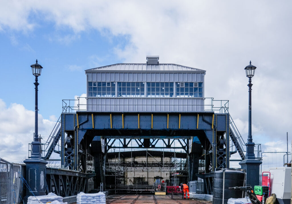 A photo of the control room of Corporation Road Bridge against a cloudy blue sky