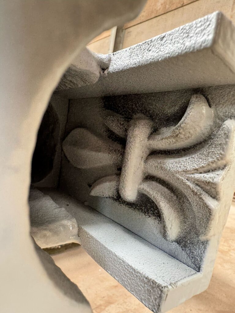 Fleur-de-lys hidden inside repaired post