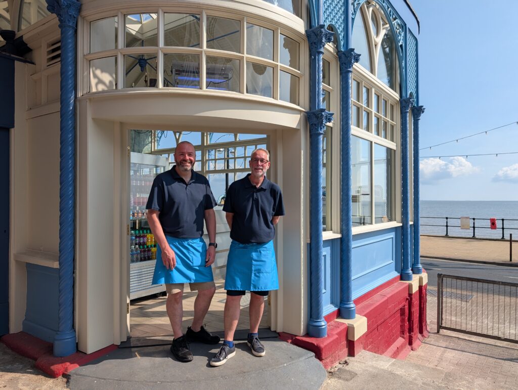 Two men stood in the doorway of the Mermaid Cafe