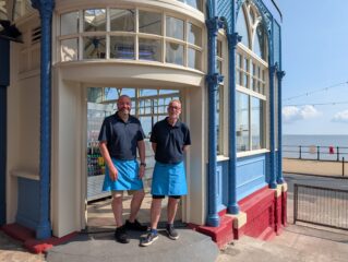 Two men stood in the doorway of the Mermaid Cafe