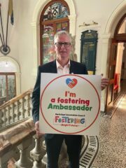 1. Rob Walsh, Former Chief Executive of North East Lincolnshire Council, pictured holding the Foster-friendly Ambassador kitemark.