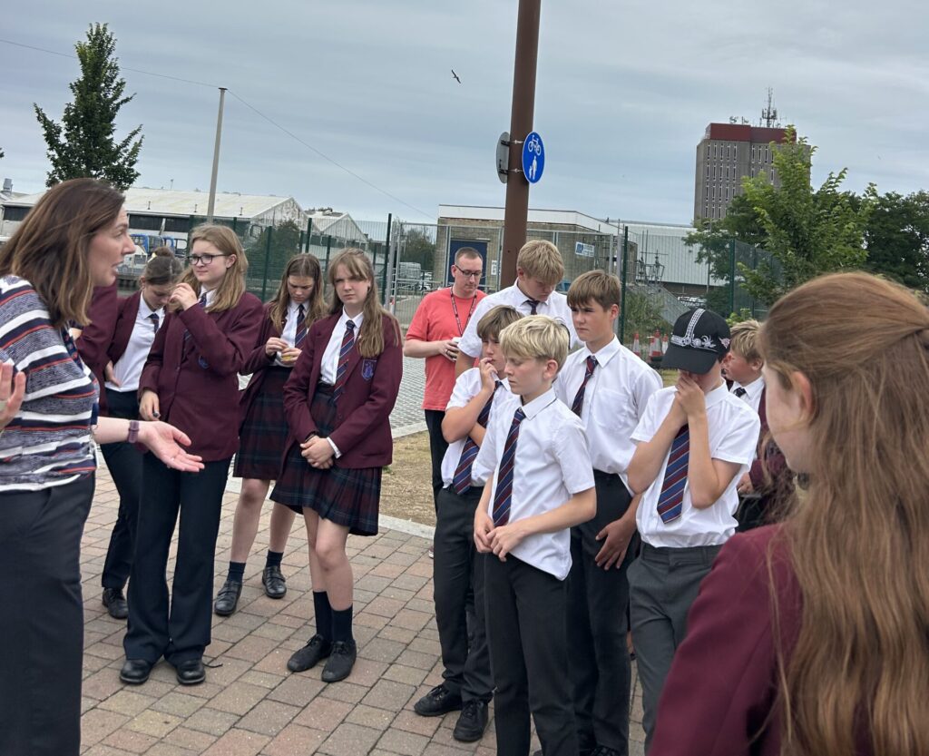 School students listening to a talk