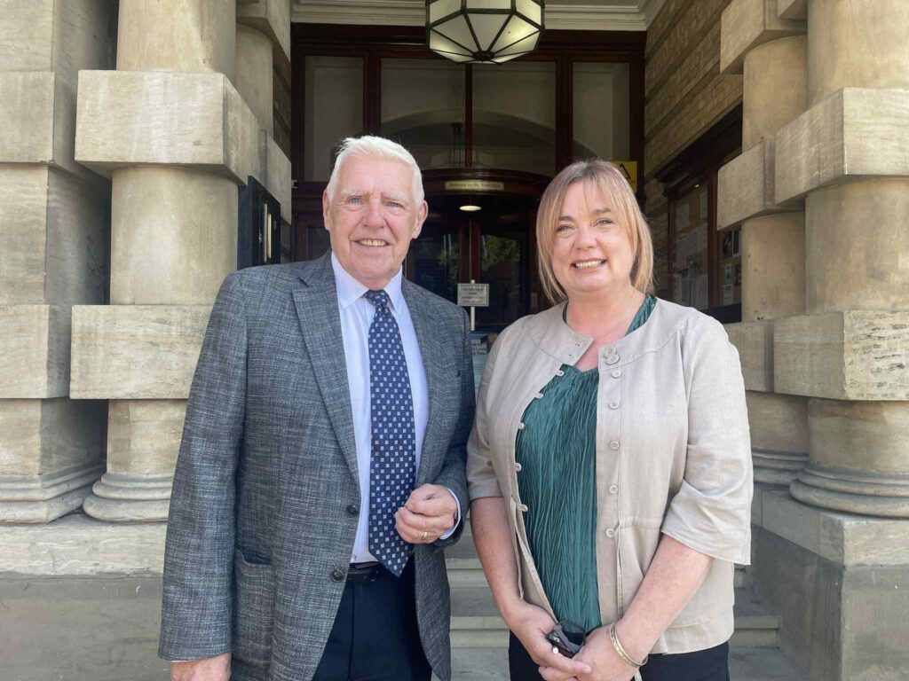 Cllr Stan Shreeve pictured with Diane Lee outside Grimsby Town Hall