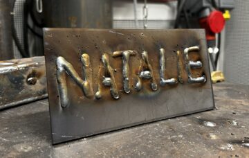 'Natalie' welded into metal