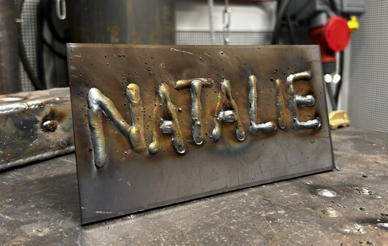 'Natalie' welded into metal