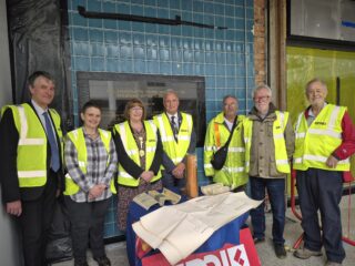 Group of people in front of the time capsule