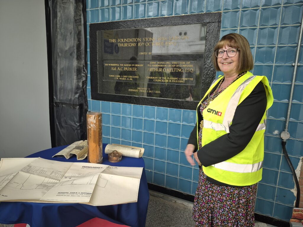 Madam Mayor with time capsule and contents