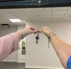 Hands holding keys