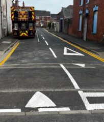 Lorry completing road marking works