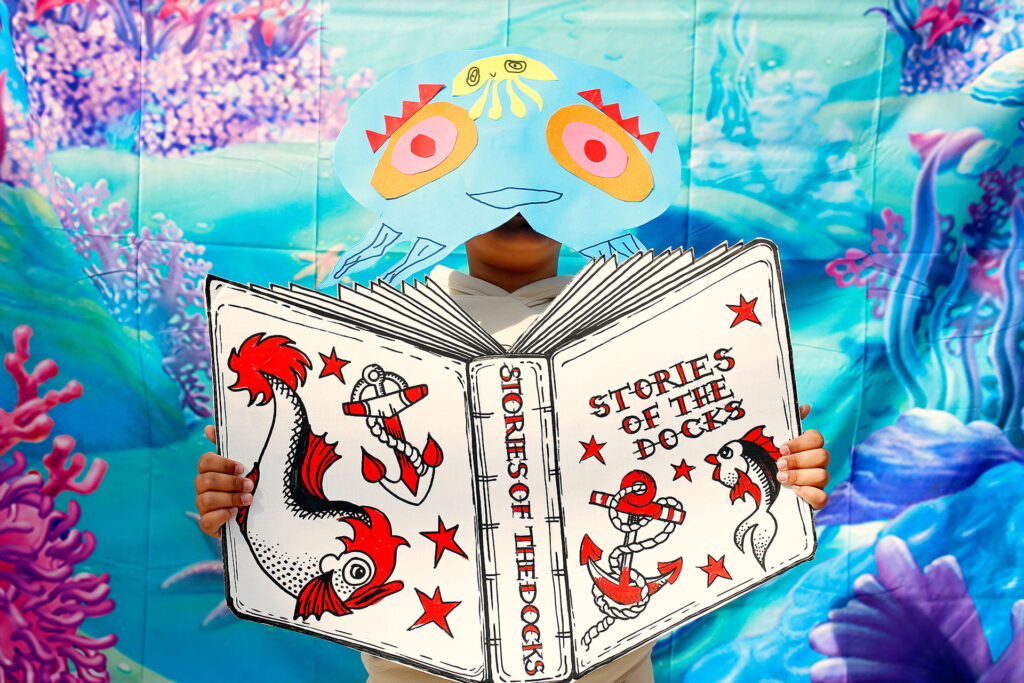 Artwork of a book with a title "stories of the docks"