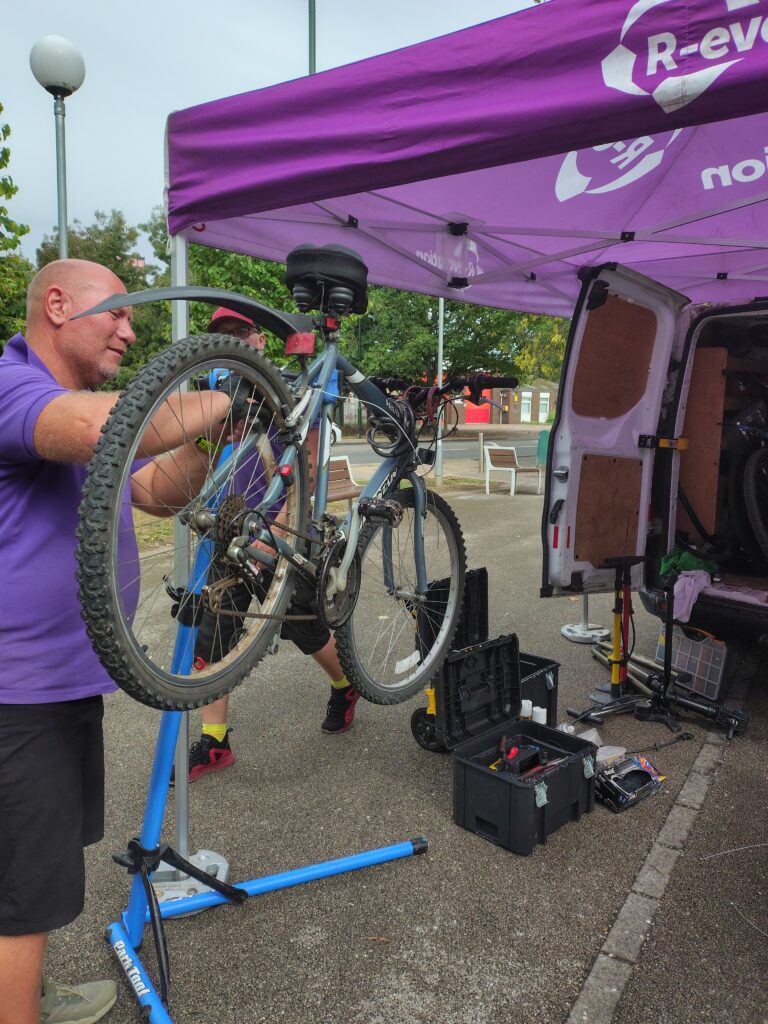 Bike technician working on bike