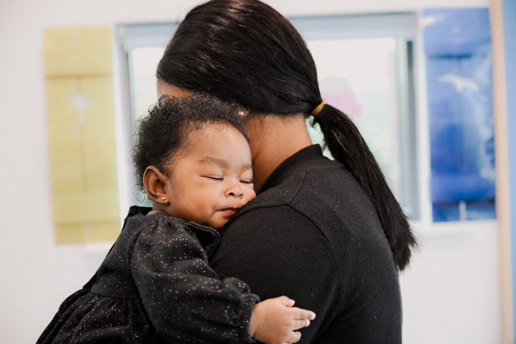 Mum and baby hugging