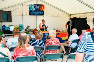 Cookery class in a tent cEmma Gibson