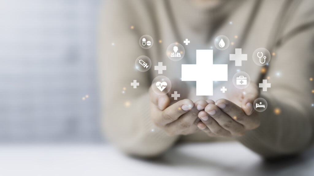 Woman hand holding plus icon for the healthcare medical icon. Health insurance concept. Benefits and Access to welfare health, doctors, hospitals, treatment with copy space