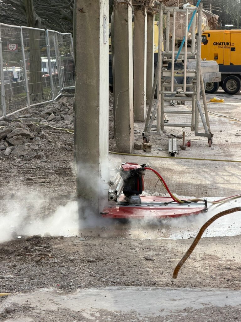 Specialist cutting equipment doing the ground level first cut