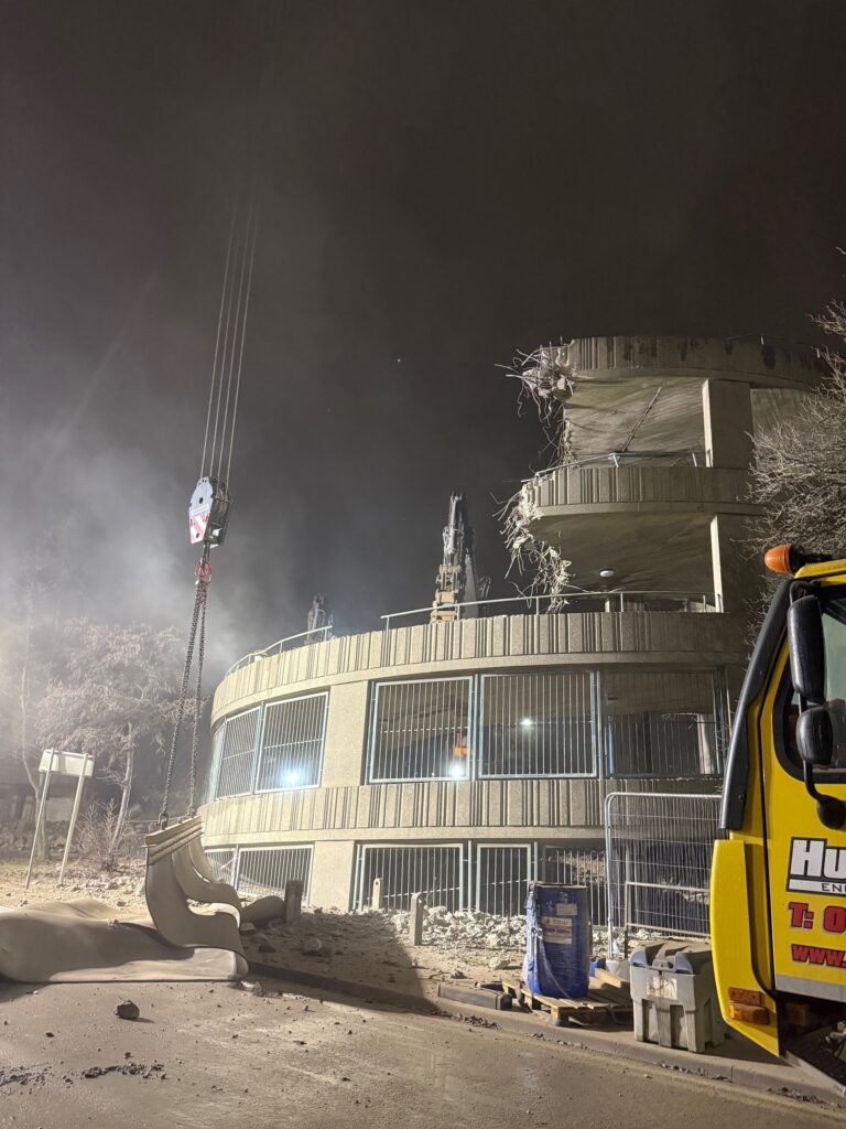 Carpark spiral demolition at night - Feb 2026