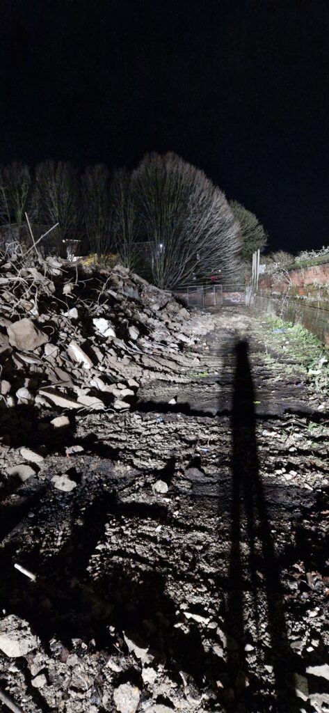 Carpark spiral demolition at night - Feb 2026