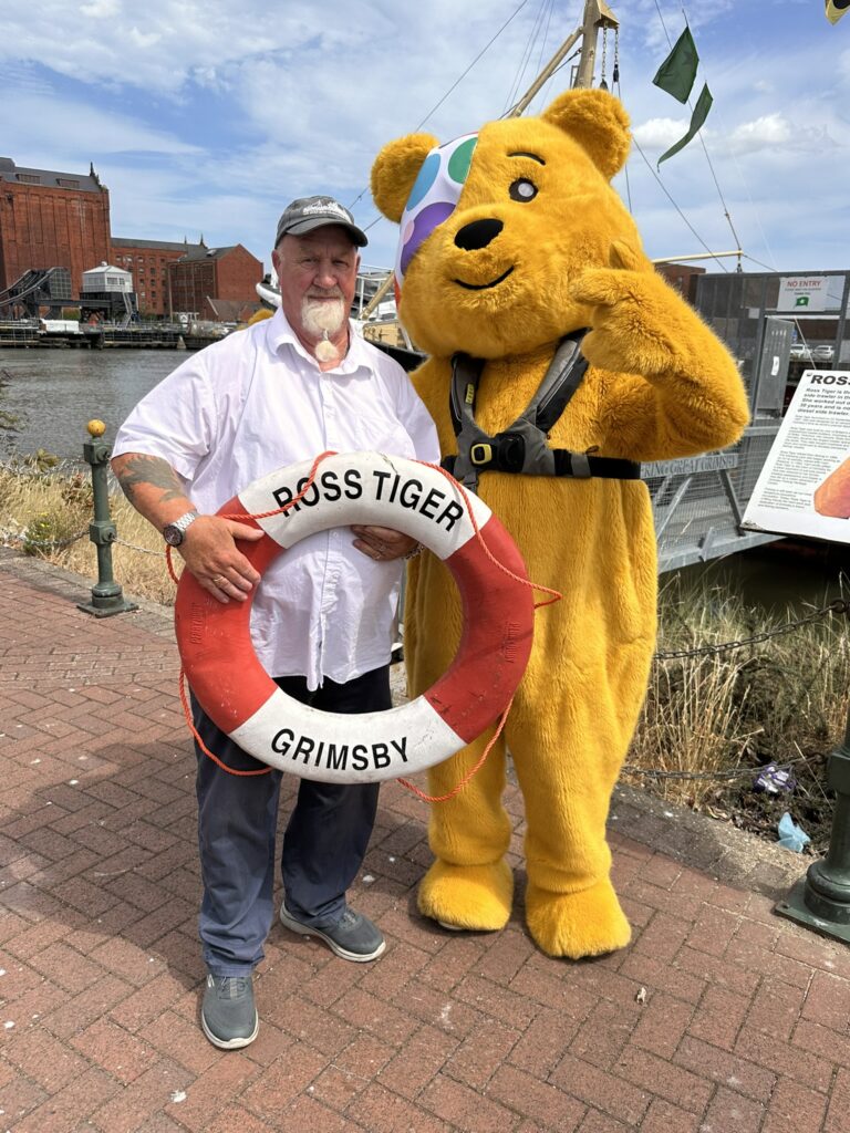 Pudsey Bear with Ron Telford, a guide from Ross Tiger