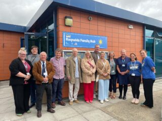 A photo of the delegation outside Reynolds Family Hub
