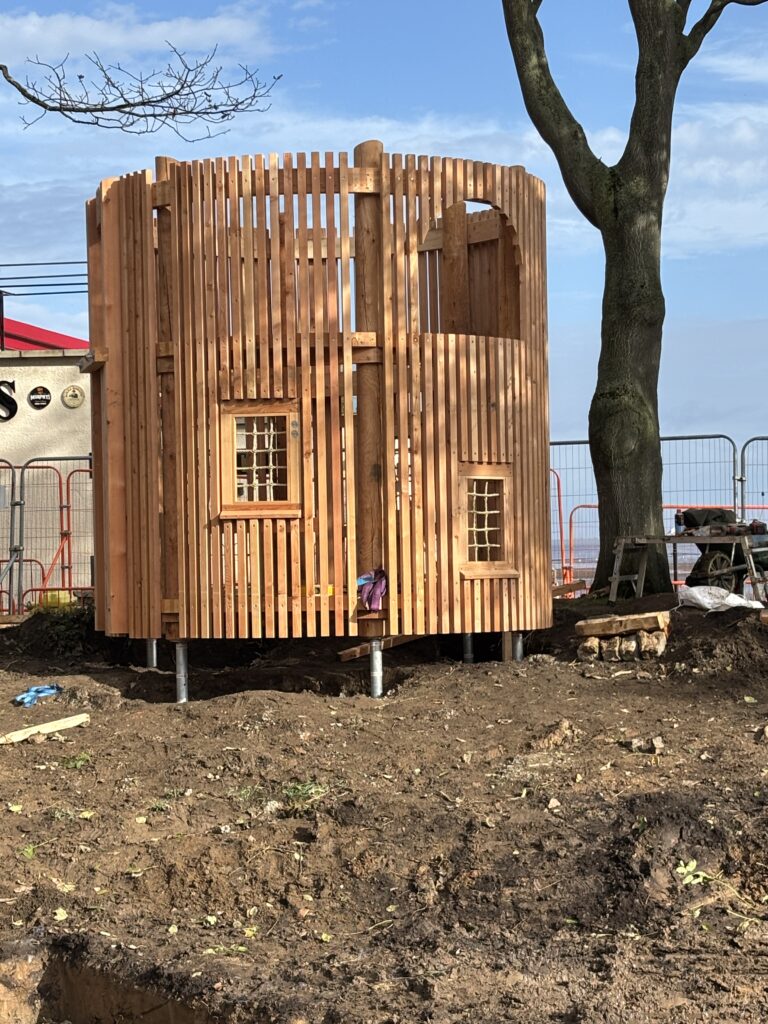 Pier Gardens play structures underway
