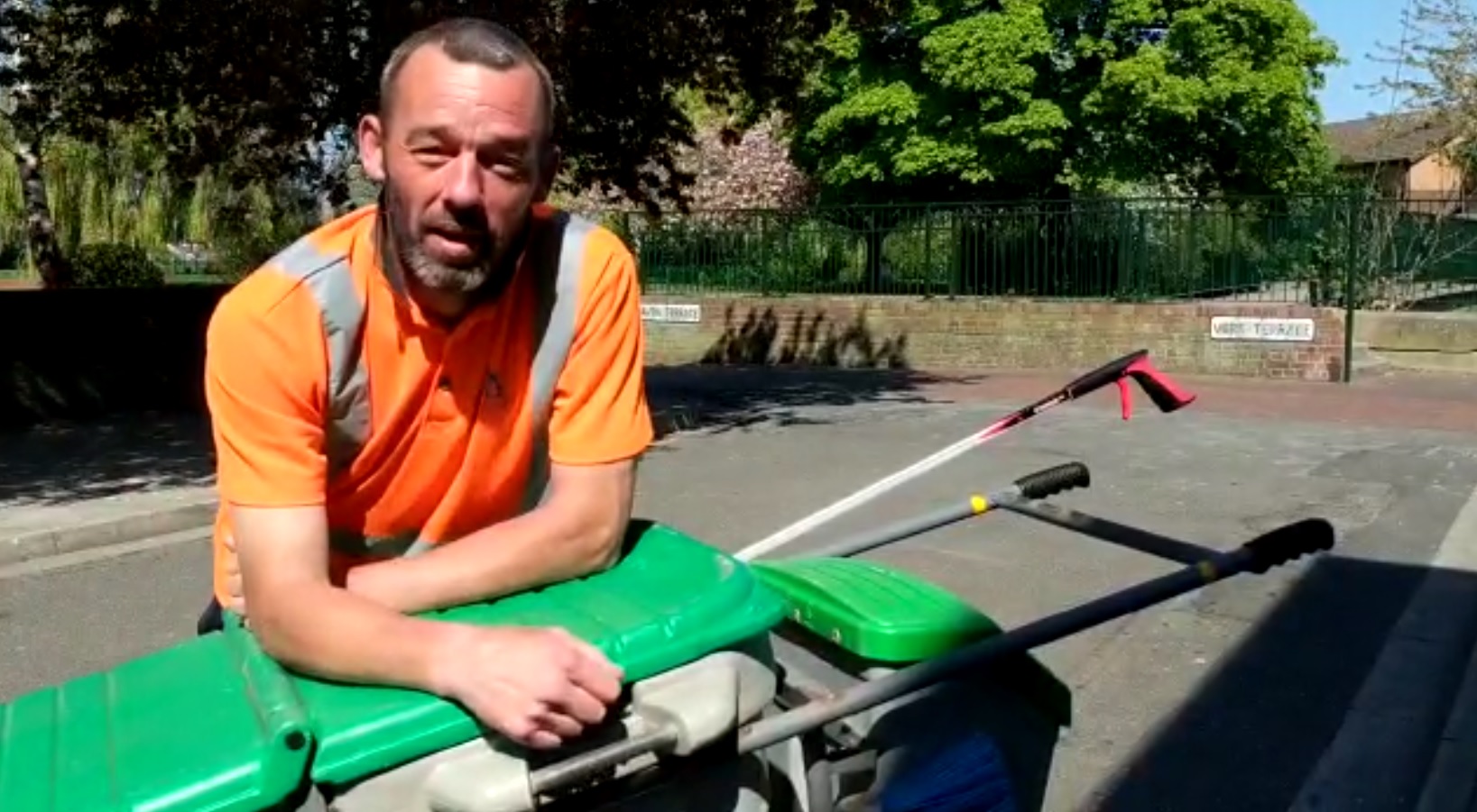 Dave Hall, from the street cleansing team, pictured with his cleaning cart on a sunny day in Grimsby.