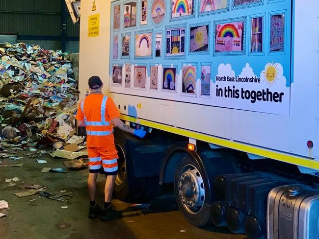 A recycling lorry unloading at the depot in Grimsby.