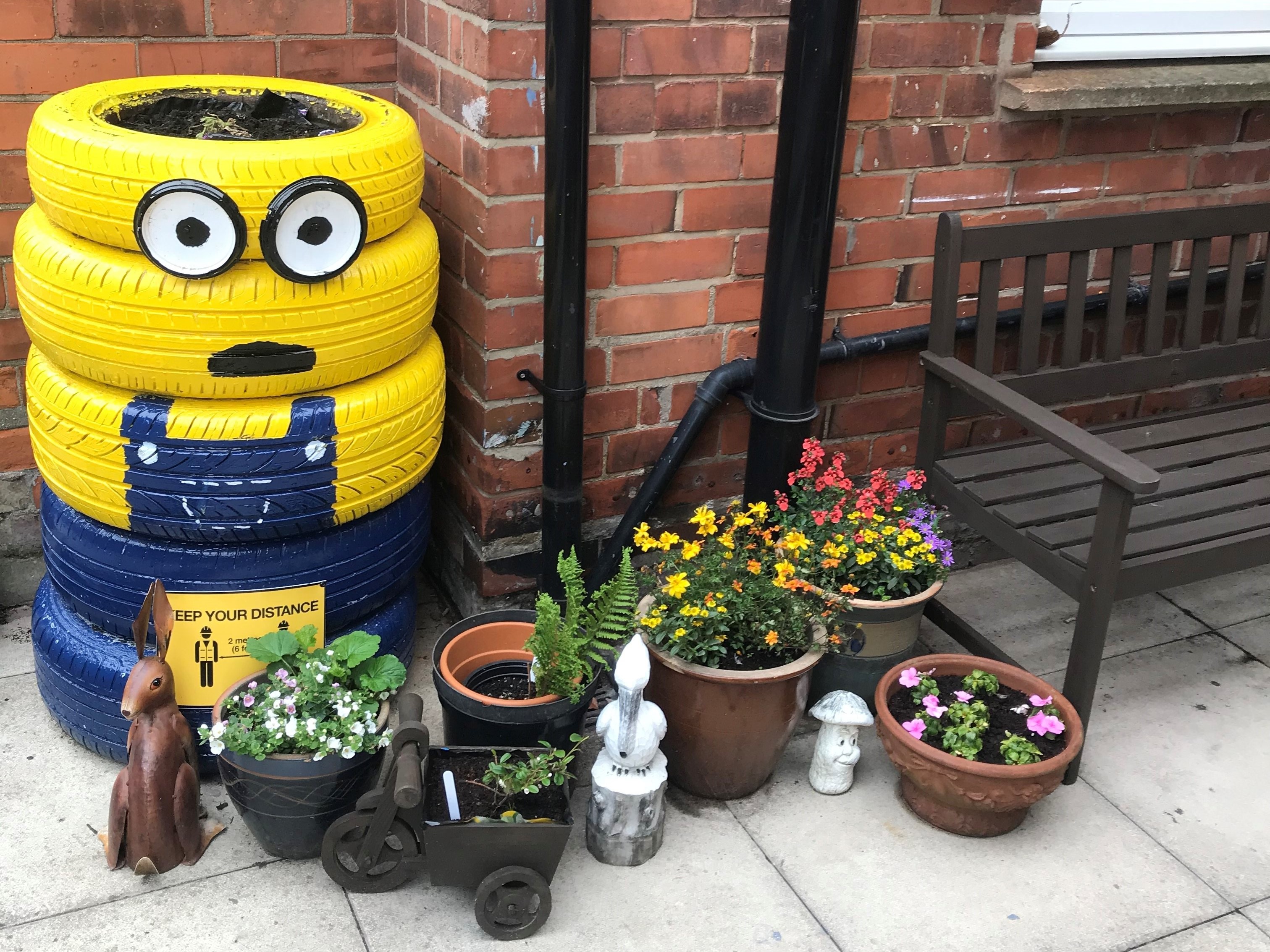 A 'Binion' character made of recycled tyres in the revamped garden at the Cambridge Street Hostel.